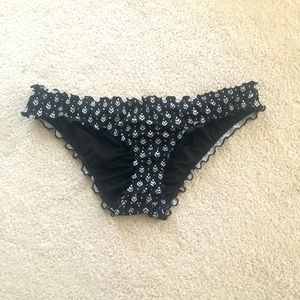 Black and white slightly cheeky bikini with ruffle